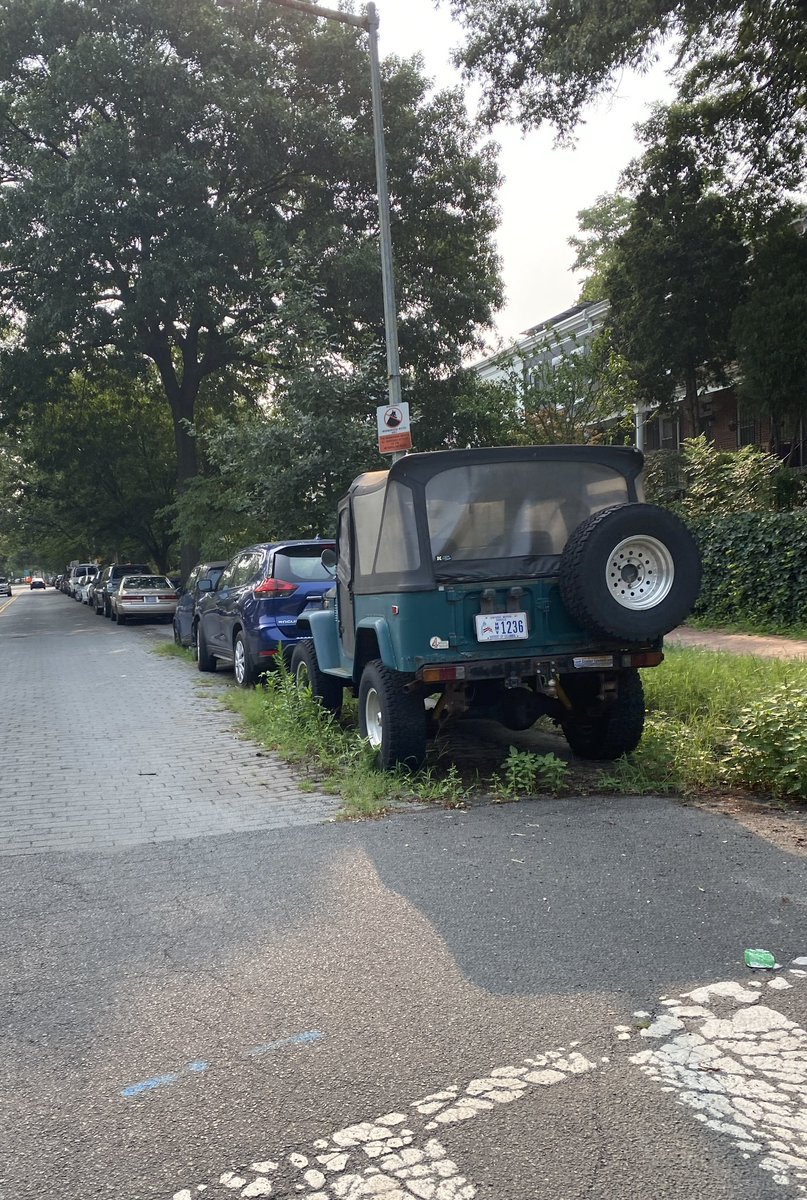 Visual proof that parking in DC is too cheap. This Jeep might as well be on blocks it’s been here so long.