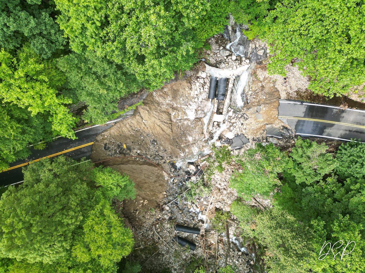 BlaiseGomez12's tweet photo. STORM DAMAGES 😳 New drone images capture devastating extent of storm damages on now-closed Route 218. 
📷 David Sirota Photography/Studio96 https://t.co/uFcokLVUqq