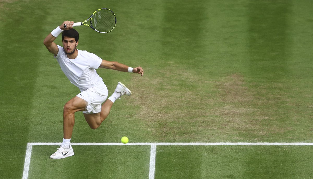 Carlos Alcaraz beats Novak Djokovic in 5 sets to win his first Wimbledon title shot for <a href="/ShutterstockNow/">Shutterstock Editorial</a>