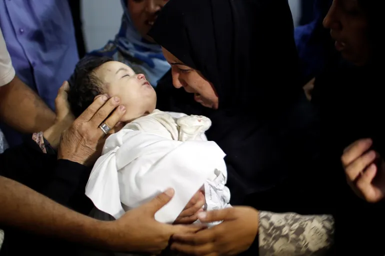 SaveSJarrah's tweet photo. 61 Palestinians were killed by Israeli fire on May 14, 2018, when thousands of Palestinians protested as the US moved its embassy from Tel Aviv to Jerusalem. The 59th victim of Israel's brutal repression in Gaza was Leila Anwar al-Ghandour, 8 months, died of tear-gas inhalation. https://t.co/gWOfrlqAsM