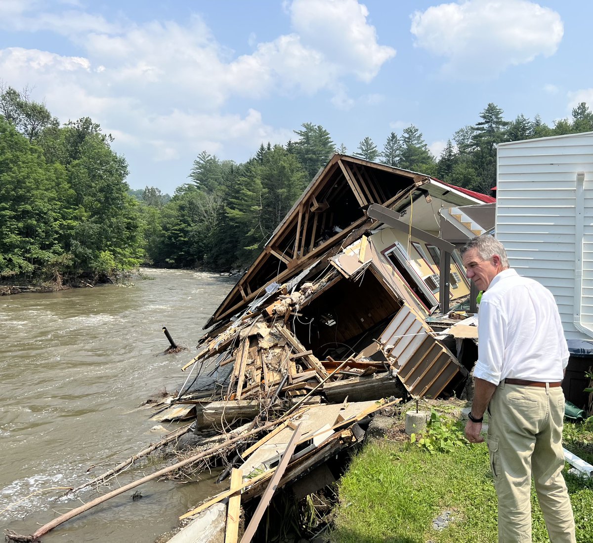 GovPhilScott's tweet photo. Today I welcomed @SecretaryPete to Vermont to observe damage to our infrastructure caused by severe flooding. I’m incredibly grateful for the close collaboration with him and his team as we transition to recovery and begin to rebuild. https://t.co/HCbzSifpqv