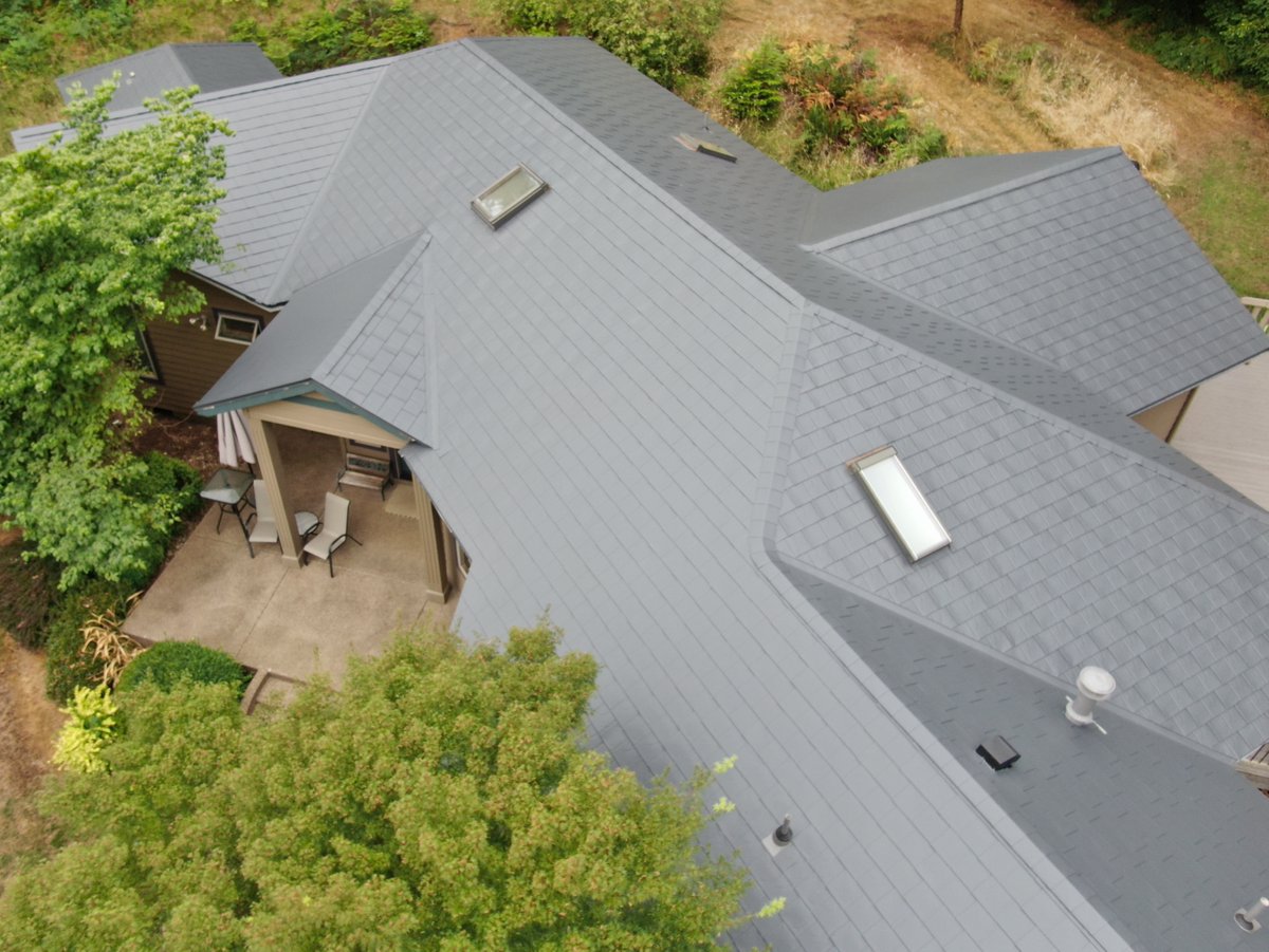 Transformation Monday!

This home in Corvallis is showcasing our Charcoal Grey Slate aluminum shingle roofing system! Quite the transformation from their old tile roof!

#metalroof #metalroofing #corvallis #bentoncounty #Roofs #roofing