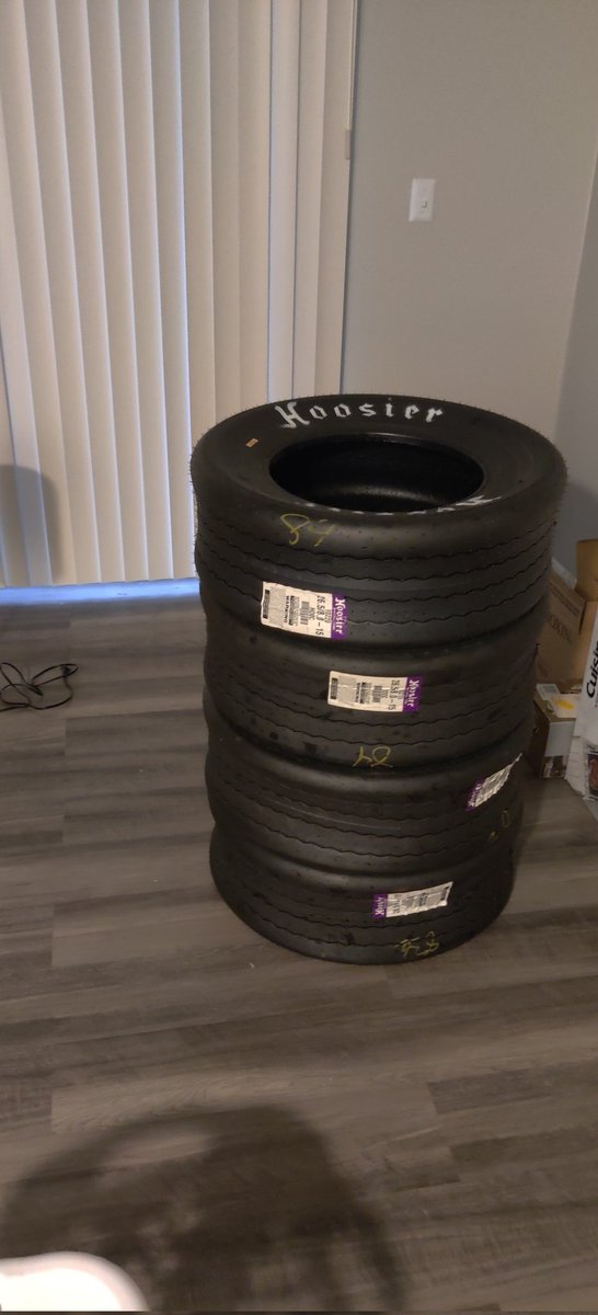 Is there furniture in this apartment? Barely. Are there race tires? Absolutely.