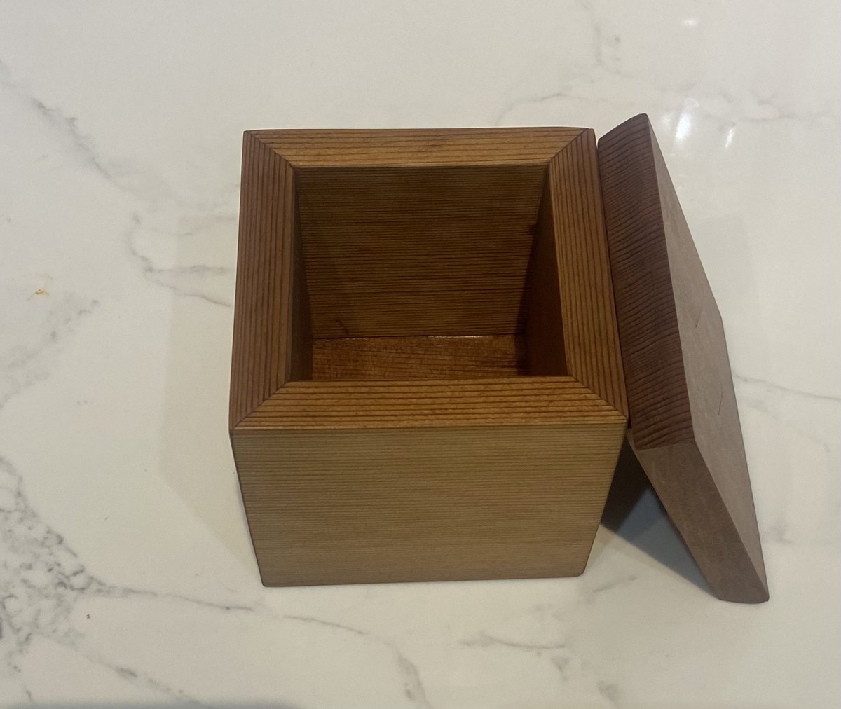 gvmcmillan's tweet photo. Photos of an urn I was commissioned to make. The box is red cedar and the lid is redwood with a cedar inlay. Finished with 3 coats of an oil blend and two coats of wood butter from @WagnerHillsBC #urn #cedarbox #gvmstudio https://t.co/q43eelZpGt