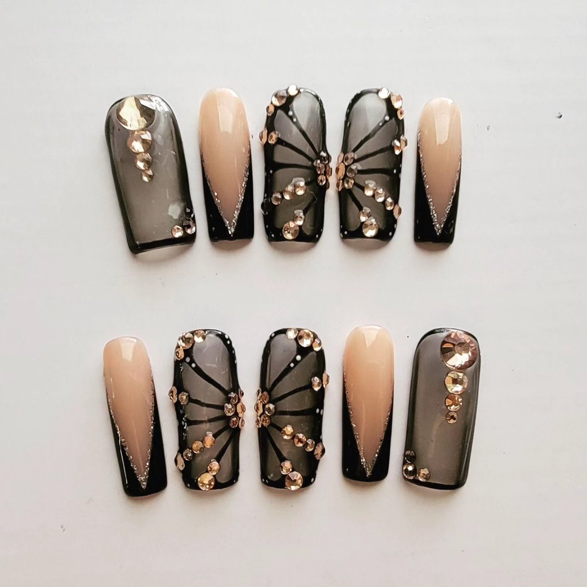 Sheer Black and Nude Nails
#sheerblack #sheerblacknails #nudenails #nudetones #jewelednails #customnailart #customnails #custumpressonnails #pressongelnails #pressonnails #pressons #gelnailart #gelpressonnails #gelart #gelnails #nailart #nails #nailsofinstagram