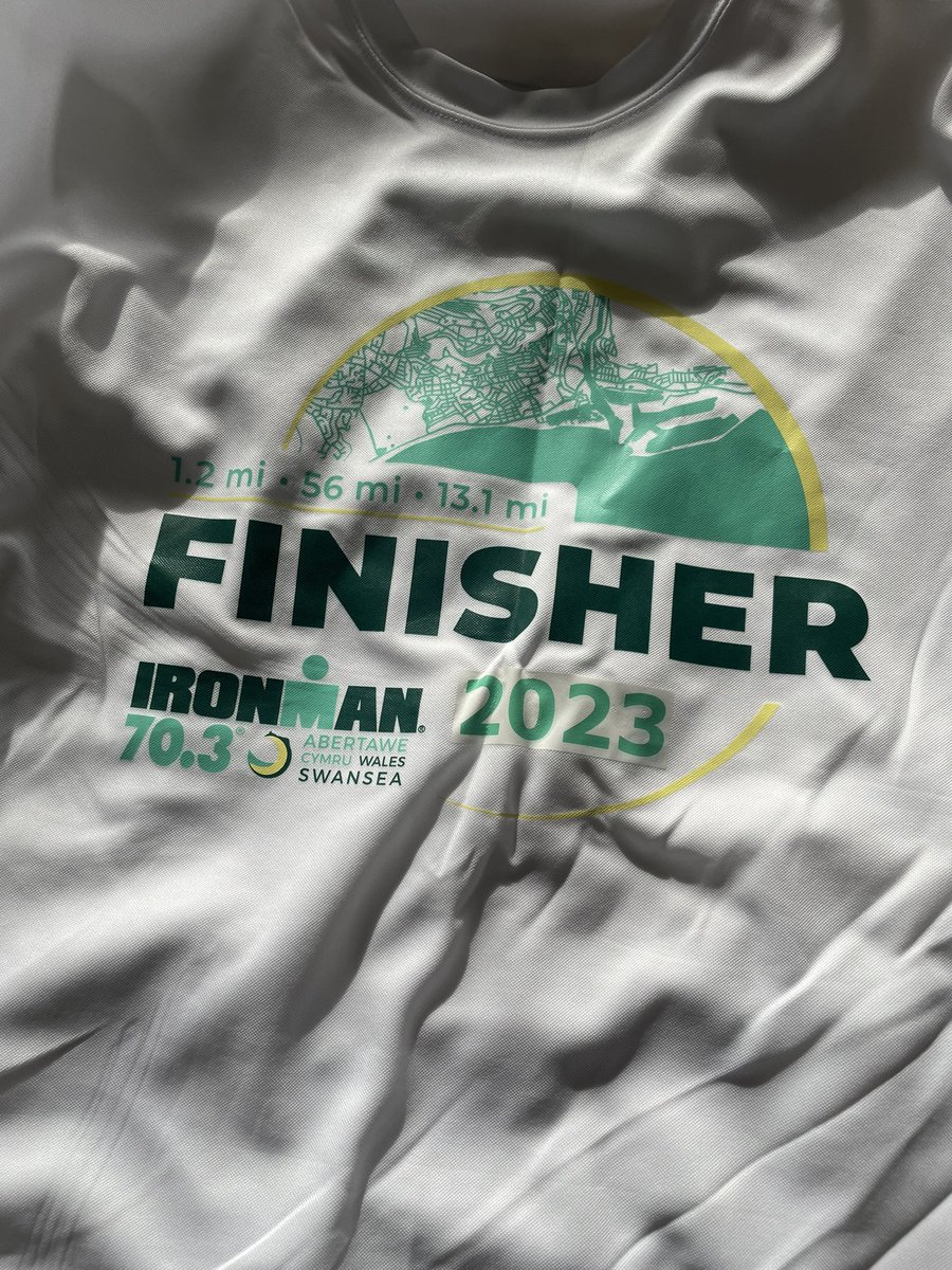 Well done everybody who finished Ironman Swansea 70.3 on the weekend. How disappointing are you with the merchandise in general and then found out that @IRONMANtri had used last year’s white T-shirt with an off white sticker to cover the year 🤬🤬🤬🤬