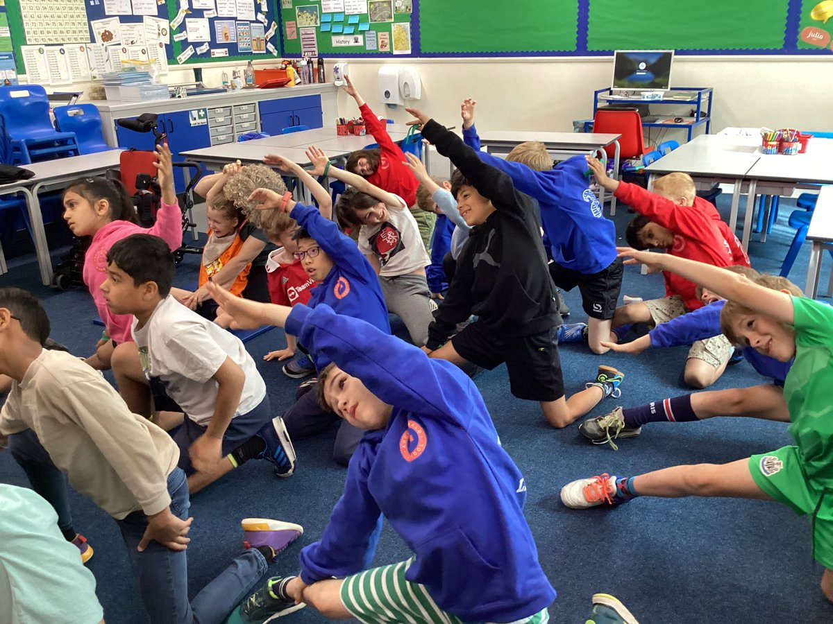 ArchibaldFirst's tweet photo. Year 4 are kicking off their Tuesday morning with a spot of cosmic yoga! #AFSwellnessweek https://t.co/F3YxJy28Kp