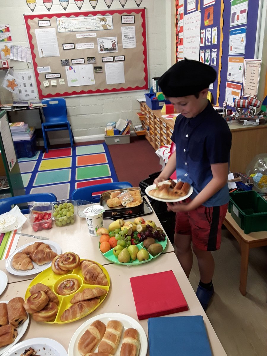 HartestSquirrel's tweet photo. Squirrel Class are celebrating all things French, with 'French Day'. So far this morning they have enjoyed a French banquet with pain au chocolat, brioche, baton, fruit and cheeses). The children have filled out a shopping list and then had to pay for their food using euros https://t.co/nWpqA8Hnfl
