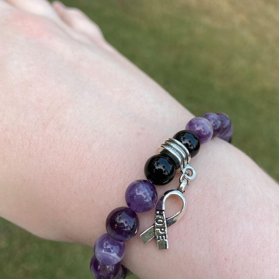 Excited to share the latest addition to my #etsy shop: Cancer Awareness Bracelet etsy.me/3NVXt80 #purple #lovefriendship #black #amethyst #unisexadults #round #gemstone #cancerawareness #handmade #love2jewelry