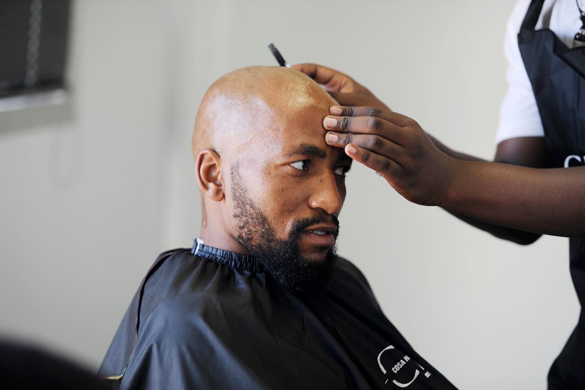 prophilani's tweet photo. As part of supporting our own initiative, Bafana Bafana players took time off in camp to visit midfielder Thabo Cele's barber shop, KwaMashu, for fresh hair cut.

The Ox finished all razors unfortunately... 😊 https://t.co/eR7crY1EKD
