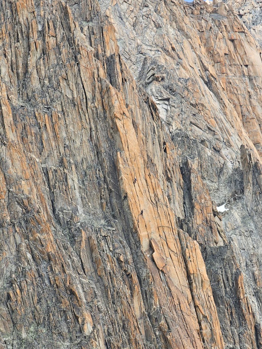 Climbers awash in a sea of granite
