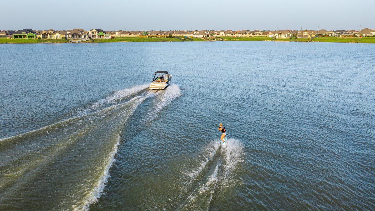 Dive into the extraordinary world of Towne Lake, a community connected by water developed by Caldwell Communities featuring our 300+ acre lake, private island, our Lakehouse with a private beach, a resort style water park, and more! TowneLakeTexas.com #TowneLakeLife