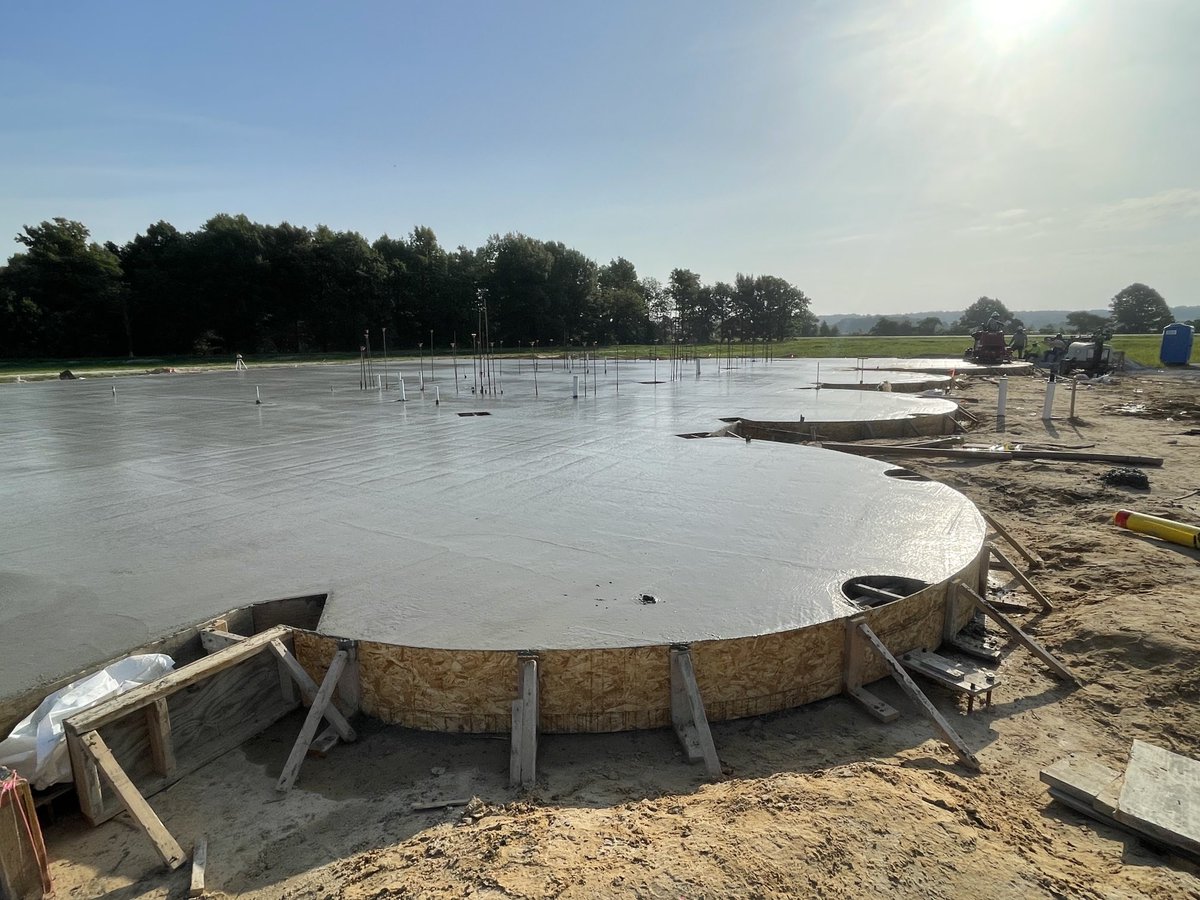 NEArkRice's tweet photo. Second concrete pour started at 2:00 AM this morning. This picture shows the foundation for the silos in front of the facility’s public space (Greenway Exhibition Hall). ⁦@uaex_ag⁩ ⁦@AginArk⁩ ⁦@GoGreenwayEquip⁩ https://t.co/gVtTHtYhZM
