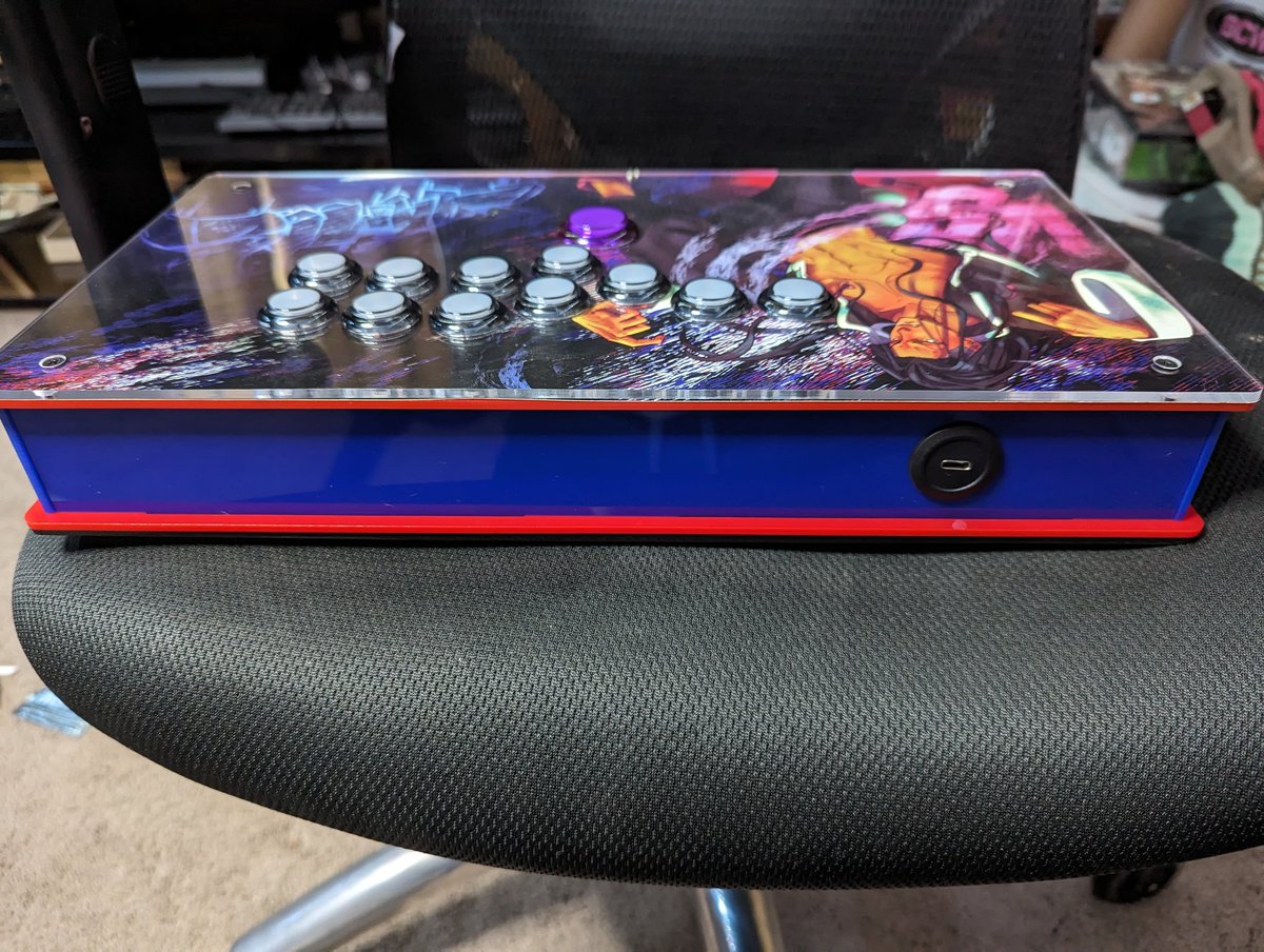 TravisDS's tweet photo. My new leverless stick, parts from @Eternal_Rival and art by @vampirarts 

Highly recommend both of them for any custom arcade sticks. https://t.co/oNJuTkZj6f