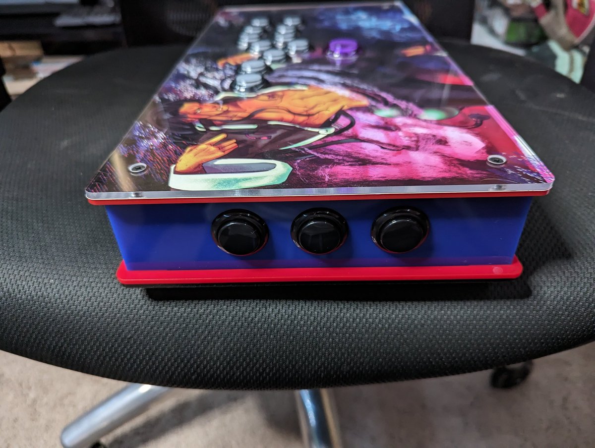 TravisDS's tweet photo. My new leverless stick, parts from @Eternal_Rival and art by @vampirarts 

Highly recommend both of them for any custom arcade sticks. https://t.co/oNJuTkZj6f