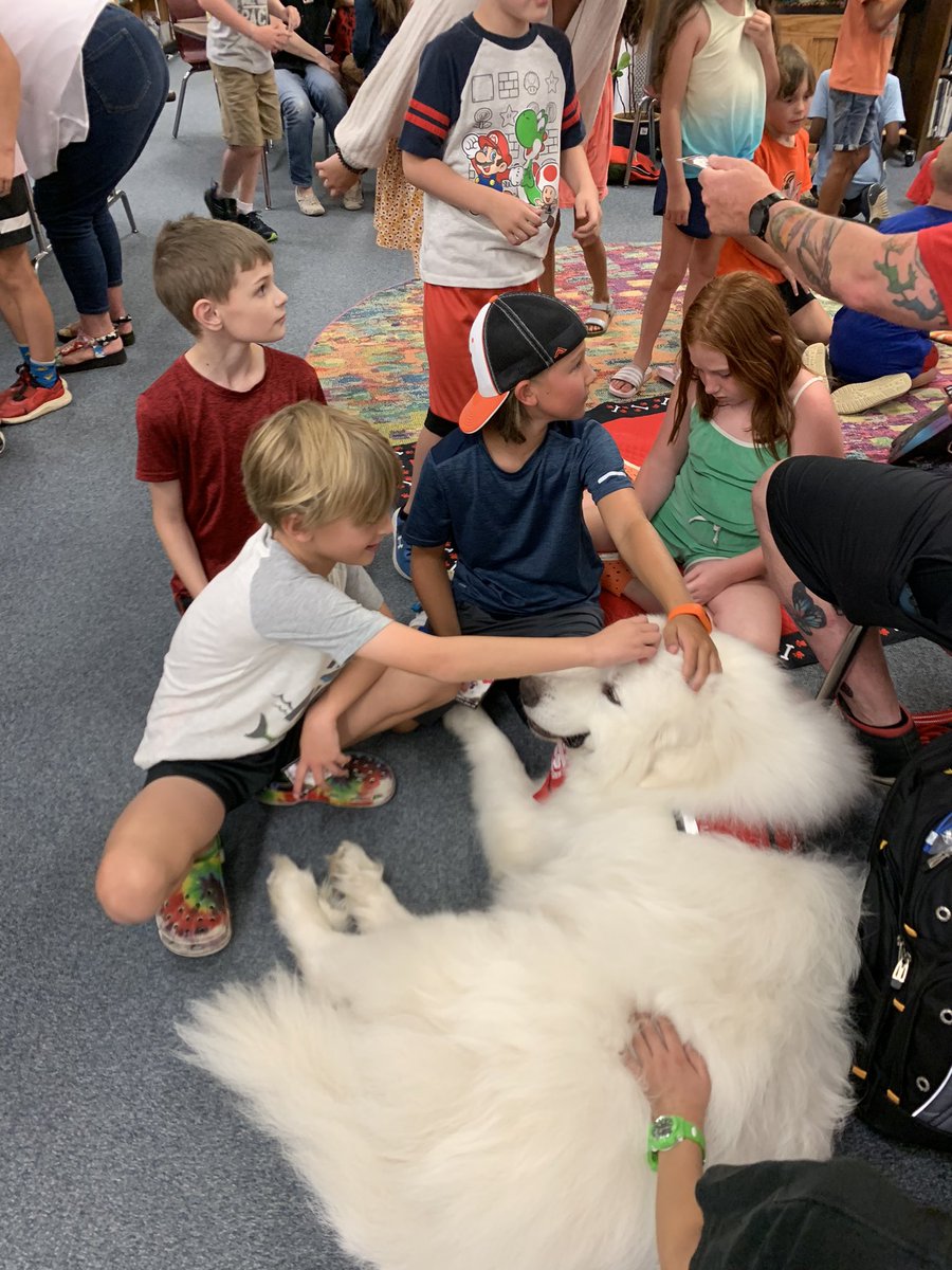 Favorite day at Elevate!  Thank you to the Go Team Therapy Dogs for coming to visit our students today!!