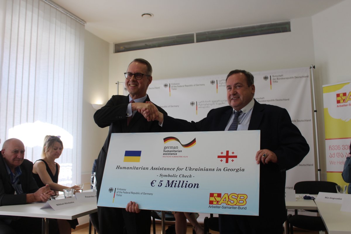 ASB_GE's tweet photo. Within German Foreign Federal Office funded project, “Emergency humanitarian assistance for conflict-affected people of Ukraine”, a press conference was held. Ambassador Peter Fischer handed the symbolic cheque of 5 million EUR to ASB Georgia’s director Clemens von Heimendahl. https://t.co/X5RfPGMgvN