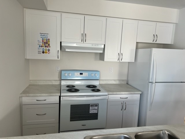 cabinetsmith's tweet photo. These SOLD signs mean that five families have a safe and affordable place to call home, thanks to @HabitatHuronia Cabinetsmith was proud to donate the kitchens for these new builds. #buildingfutures #community #home https://t.co/aj8oLt0LHm