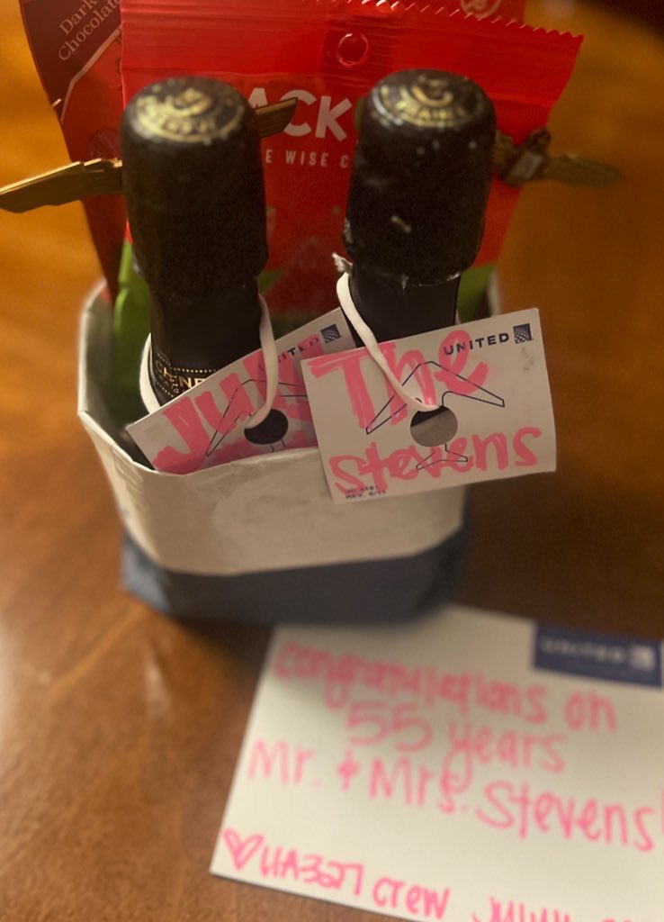 KarisaWorkman's tweet photo. The Captain, Crew &amp; Passengers of #UA327 were amazing! The Captain made a congratulatory message about my parent's 55 years of marriage. The Crew crafted and presented a celebratory card and gift bag. 90-ish% of Passengers congratulated Mom &amp; Dad. Thank You, #UA327 Crew! 7/16/23. https://t.co/OuN5FD2GTU