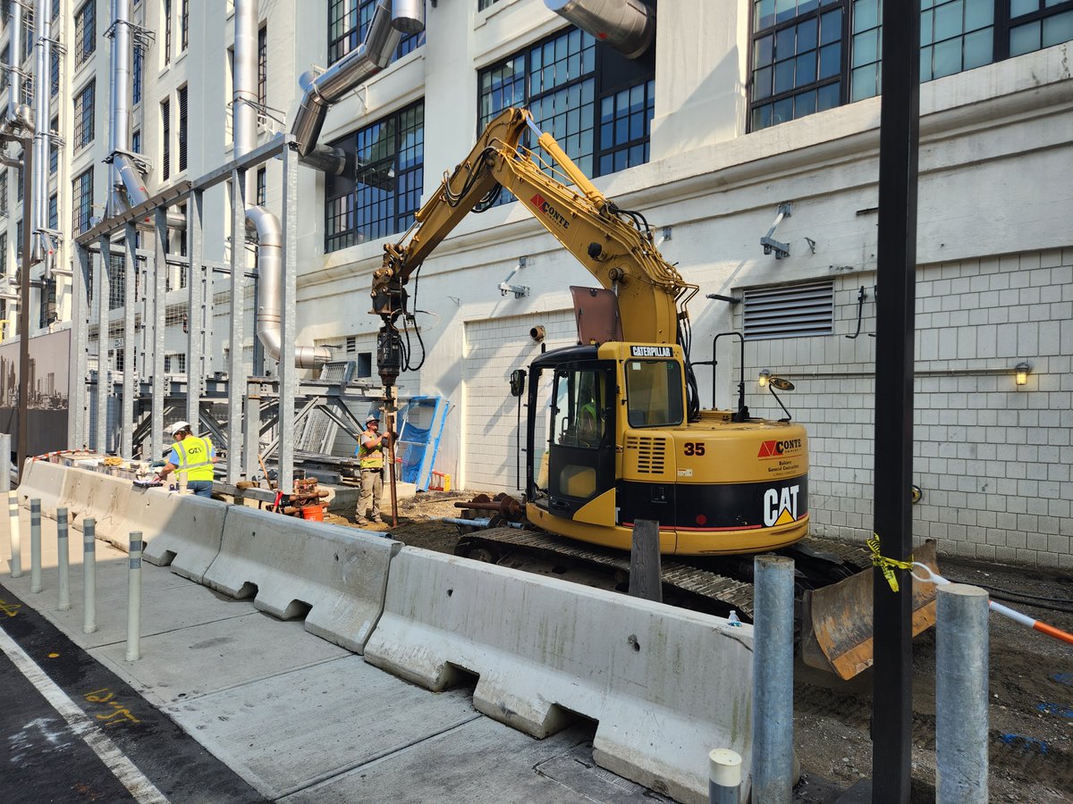 conte_company's tweet photo. In the South Boston seaport area installing #Drivecast piles. The site is tight, but we can use relatively small equipment to install these 95’ grouted displacement piles through the fill, organics, and clay! https://t.co/amIg3FkuK7
