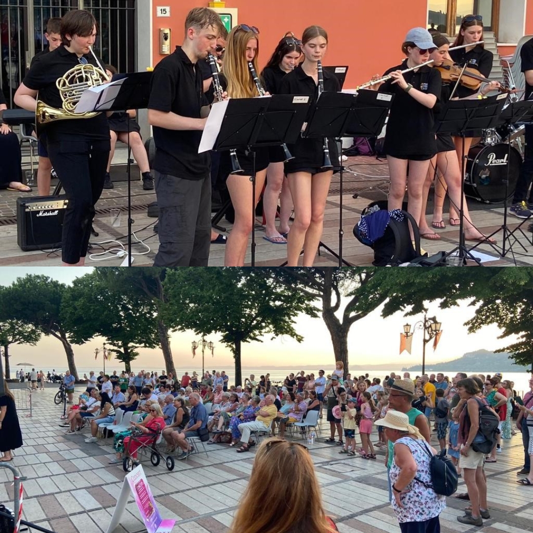 QEcrediton's tweet photo. QE Jazz Band is halfway through its concert tour in Italy. Despite the extreme heat, the band is wowing audiences in picturesque locations along the shores of Lake Garda every evening and having adventures during the days. What a rewarding end to a productive and creative year. https://t.co/1VMJWig3VV