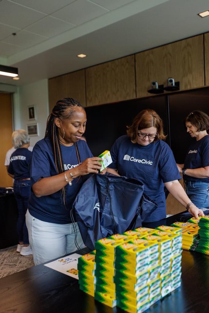 CoreCivicGiving's tweet photo. We were proud to support @UWNashville’s Stuff the Bus Day of Action! Together, @CoreCivic employees packed 100 backpacks full of supplies for area students! #betterthepublicgood https://t.co/Z7dhfvPFXn