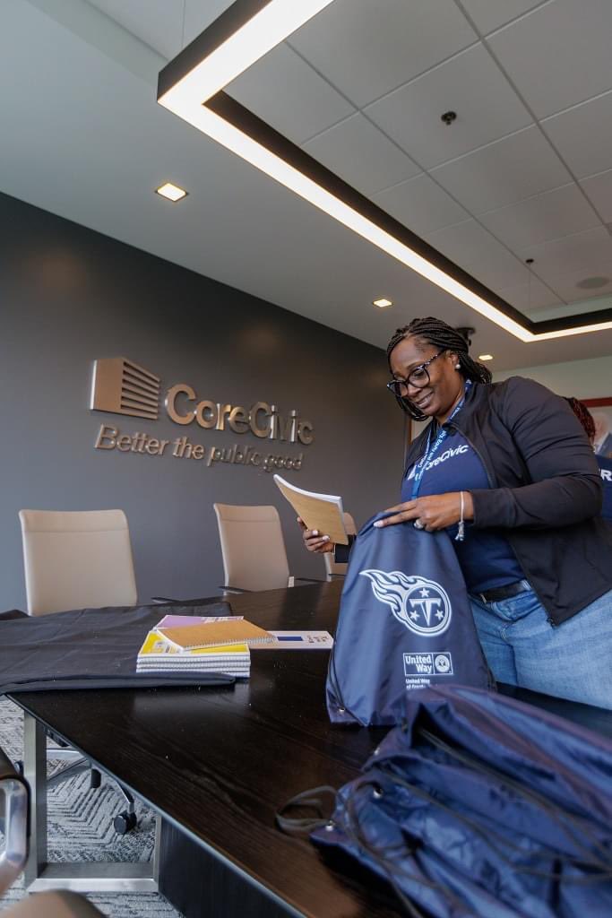 CoreCivicGiving's tweet photo. We were proud to support @UWNashville’s Stuff the Bus Day of Action! Together, @CoreCivic employees packed 100 backpacks full of supplies for area students! #betterthepublicgood https://t.co/Z7dhfvPFXn
