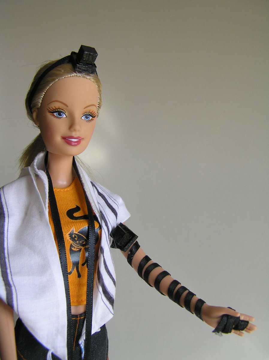 JArtsBoston's tweet photo. We're totally KVELLING over Tefillin Barbie this week. 😍  

Tefillin Barbie was created by artist Jen Taylor Friedman. Discover this masterpiece &amp; more of the best of Jewish art at https://t.co/GK3NqGfNkq, the digital destination for Jewish arts and culture. https://t.co/k3wMUkobtC