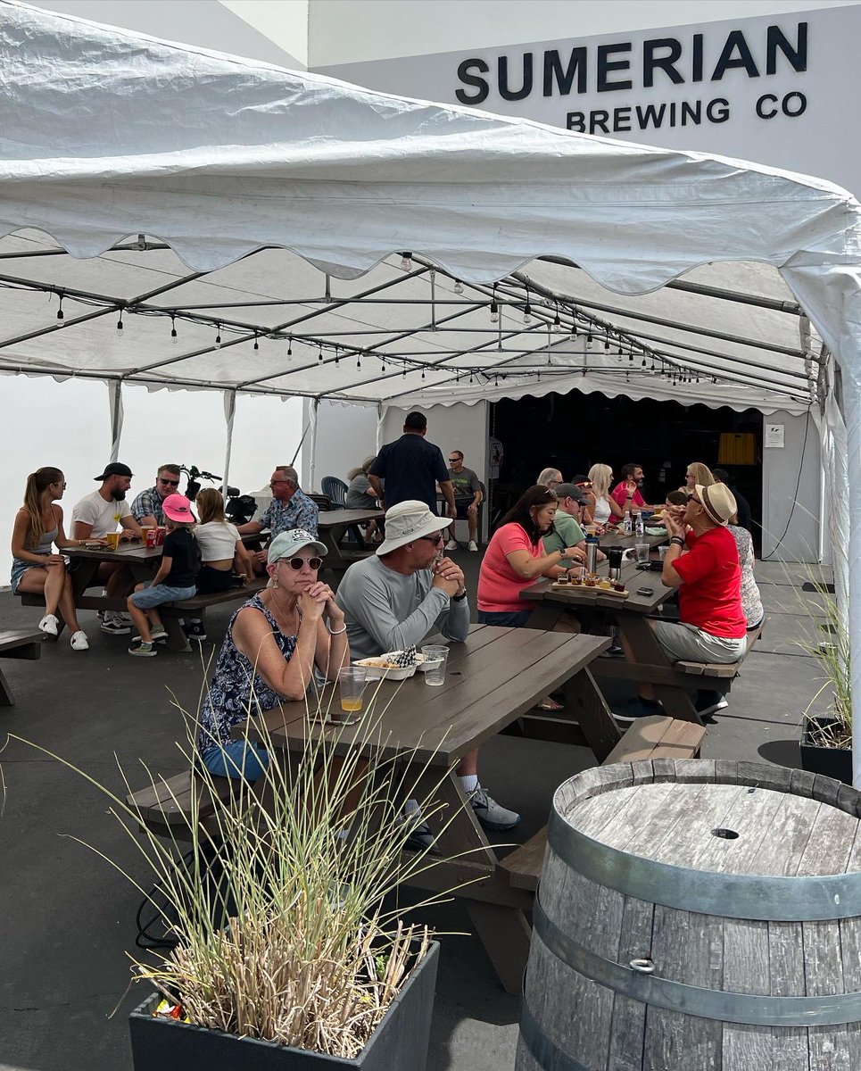 SumerianBrewing's tweet photo. Our #beergarden is a place to enjoy the warm weather, socialize, and sip refreshing  beverages. Picture yourself sitting at a rustic wooden table beneath a canopy, with a gentle breeze and the sun shining down. Feeling it? Now c’mon down to experience it. 🤟🏼🍻☀️ https://t.co/VuOtV3osoJ