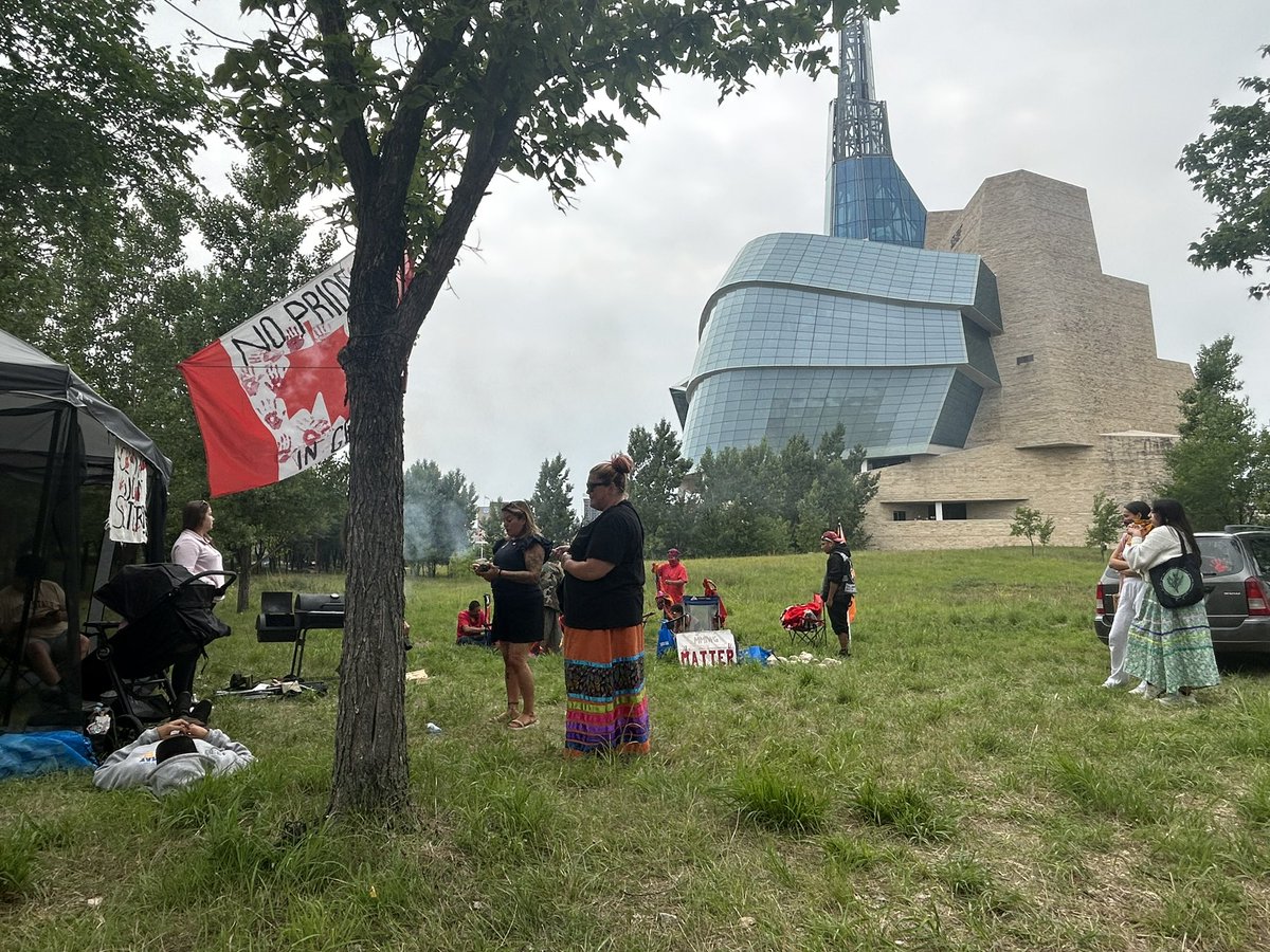 cameronmaclean's tweet photo. Camp Marcedes setting up on the grounds beside the Canadian Museum for Human Rights. Protesters who had been blocking the entrance to the Brady Road landfill have moved here, after the city and police dismantled the barricades this morning. https://t.co/OPWAbAxD4g