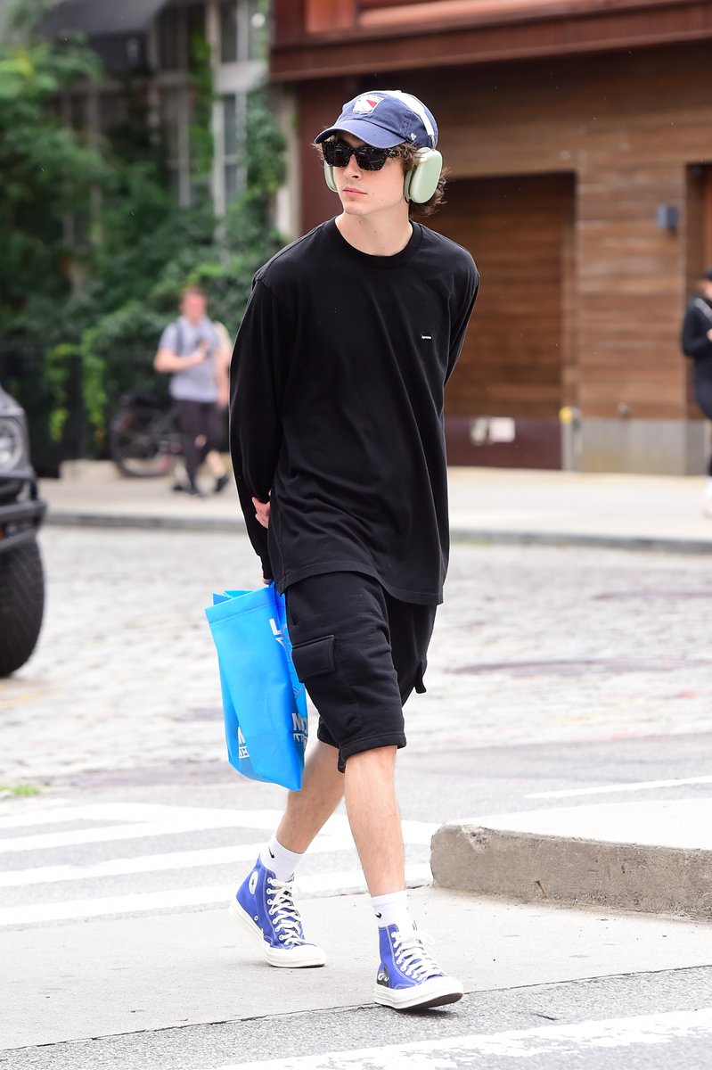 IndieWire's tweet photo. Timothée Chalamet walking around SoHo today is *the* Tuesday mood. https://t.co/8hgVsovxPJ