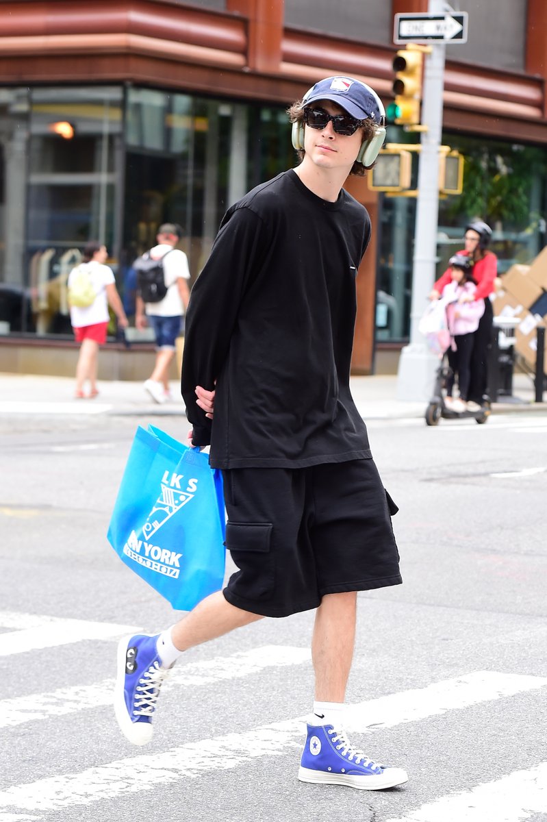 IndieWire's tweet photo. Timothée Chalamet walking around SoHo today is *the* Tuesday mood. https://t.co/8hgVsovxPJ