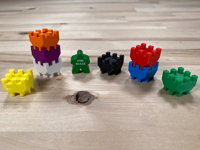 thegamecrafter's tweet photo. We added Tower Stackers to our Board #GamePieces Shop! They are made of plastic, available in 8 colors, can be stacked, and 3D printed at The Game Crafter. 17mm meeple included for scale. Available at https://t.co/uSVsf8jJ7z #GamePiece #Miniatures #GameDesign #BoardGames https://t.co/ERvVB3TuVE
