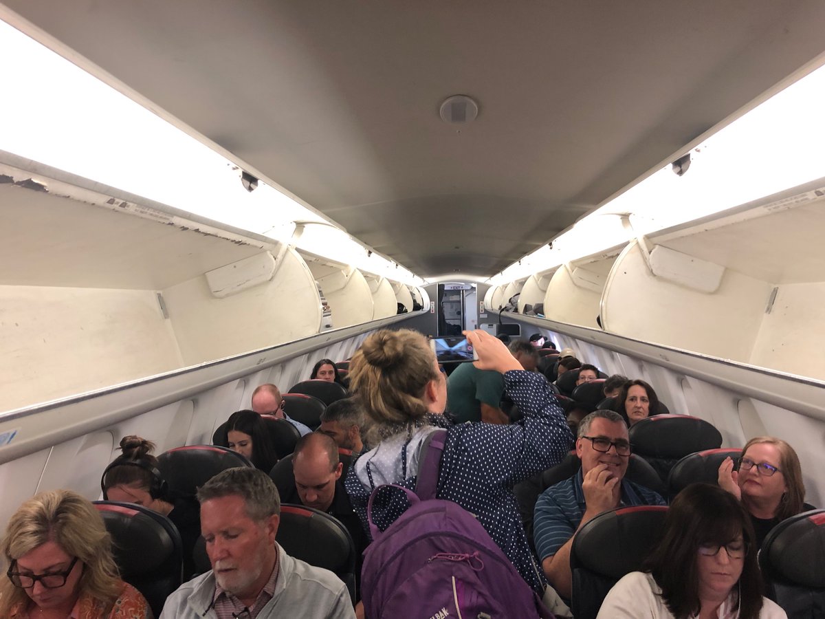 JonF4Jesus's tweet photo. @AmericanAir Why do you lie to us that the overhead bins are full when they aren’t? It isn’t very American to do that. Frustrating. Why can’t you just be honest? https://t.co/ykHwHD9W13