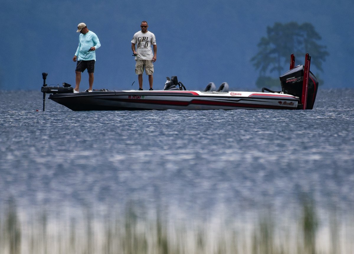 .<a href="/UnionLeader/">UnionLeader.com</a> A couple of fisherman hang in there fishing as the wind picks up, the sky darkens and a lighting storm threatens at Lake Massabesic moments ago.