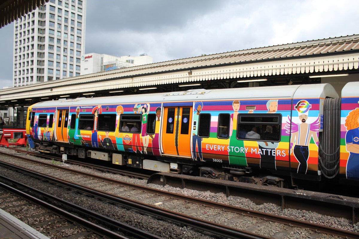 303032T's tweet image. Wearing an eyecatching overall wrap for Pride, a very colourful 378205  awaits departure from Clapham Junction with 2L21 10.23 service to  Stratford 12.7.23 @tfl #class378 #londonoverground #londonovergroundpride scottishtrains.zenfolio.com/p638436452/e72…