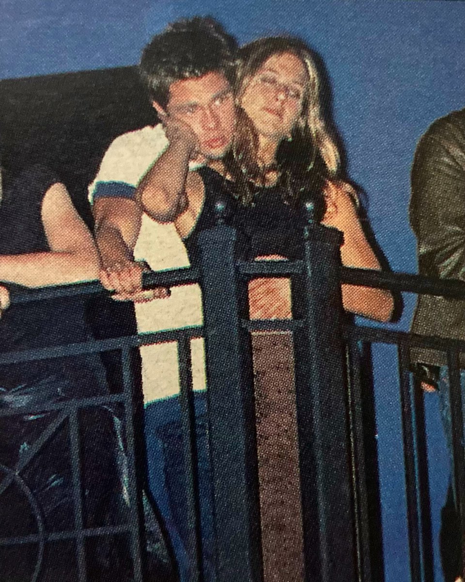 this is Brad Pitt and  Jennifer Aniston at a surprise Radiohead club show in DC in 1998, I was actually there too in the front row so just kinda zoom out and imagine an 18 year old Matthew totally unaware of them but losing his mind to 