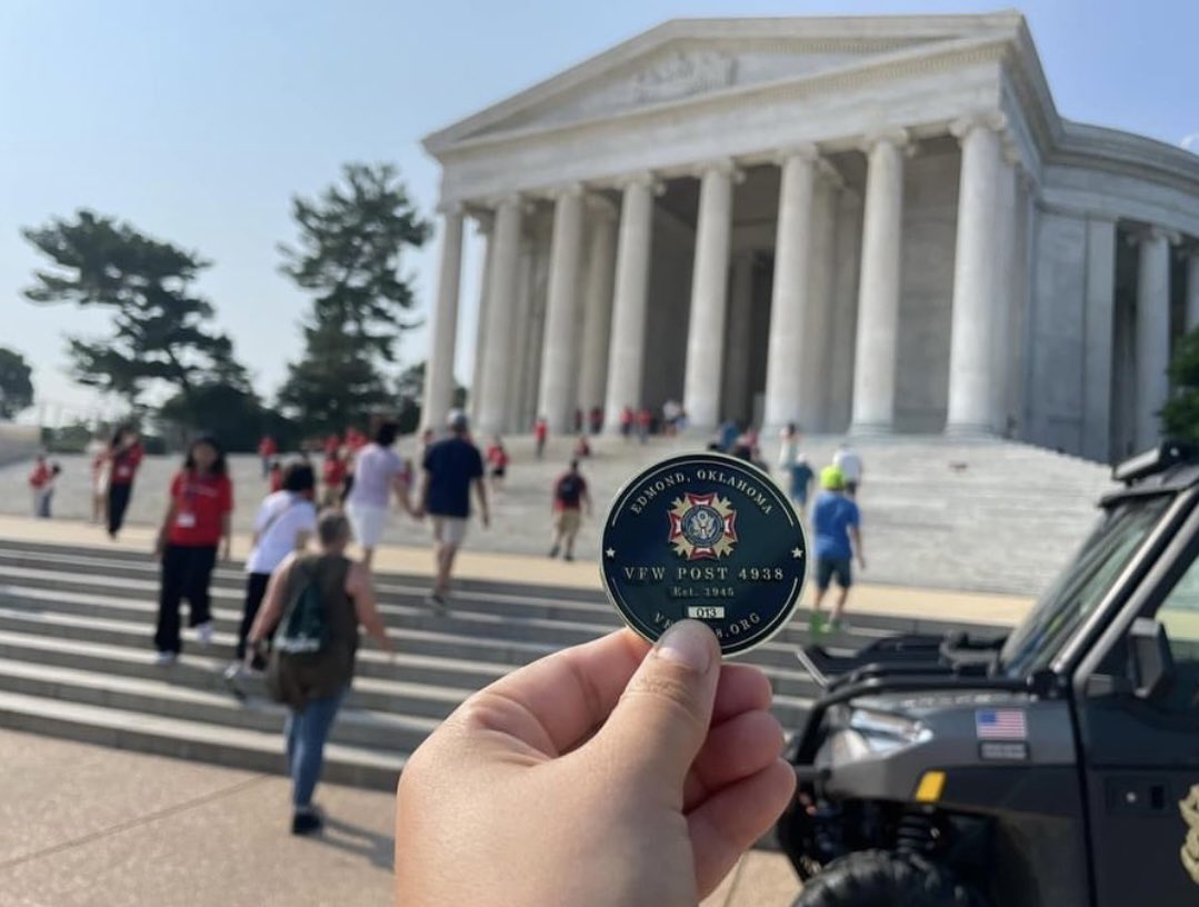 EdmondVFW4938's tweet photo. Our members go far and wide to prove how we are always #stillserving! Having been selected to help do restoration and care to keep the Arlington National Cemetery the honorable and beautiful place it is, our Auxiliary SVP took our post challenge coin on an adventure #stillserving https://t.co/CYKk4kCUt3