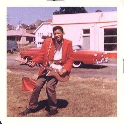 Jimi Hendrix at age 15 with his first electric guitar, 1958.