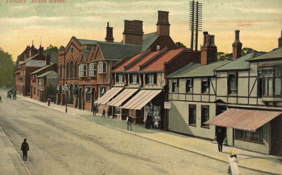 #objectoftheweek postcard of Brand Street in 1904 looking virtually unrecognisable from today! #Hitchin Town Hall and the future site of our museum are hidden by the Coffee Rooms Temperance Hotel and the Dog Inn on the left of the shot.