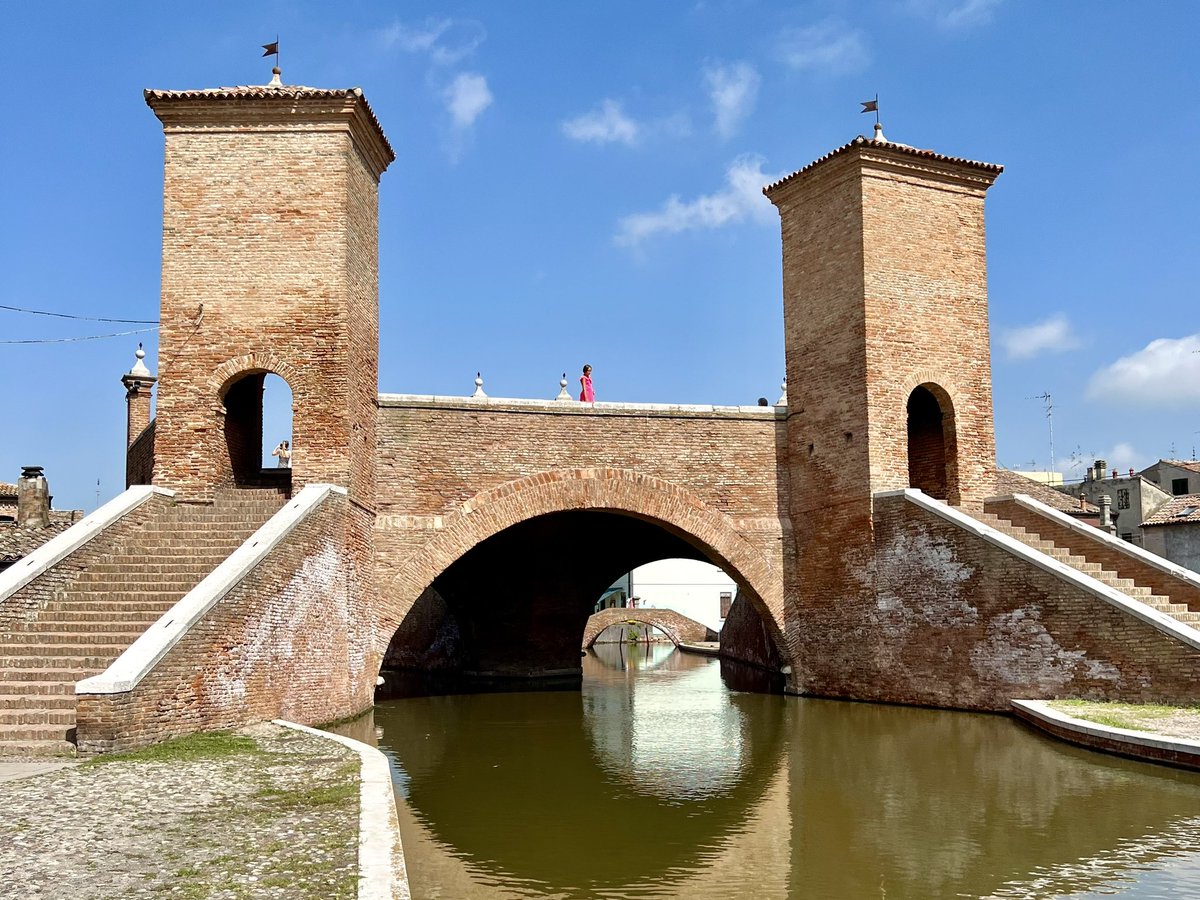 velvetescape's tweet photo. Comacchio, also known as ‘Little Venice’, is an old fishing town built on 13 islands in a lagoon south of Venice. It doesn’t have the grandeur of Venice but it definitely has lots of charm and serene beauty. It’s one of my favourite places #inEmiliaRomagna #visitcomacchio ad https://t.co/K2BD2hZJZD