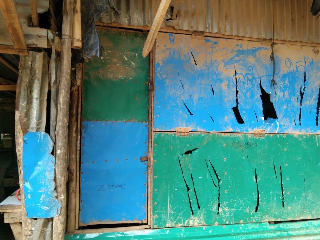 shafiur's tweet image. Large shop in #Rohingya Camp 1, shuttered &amp;amp; marked for demolition under direction of Mr. Kathowipru Marma, the CiC. Smaller shops demolished yesterday.

With WFP ration cuts, income from shops, now more critical -  adding another layer of harshness to this unwarranted destruction