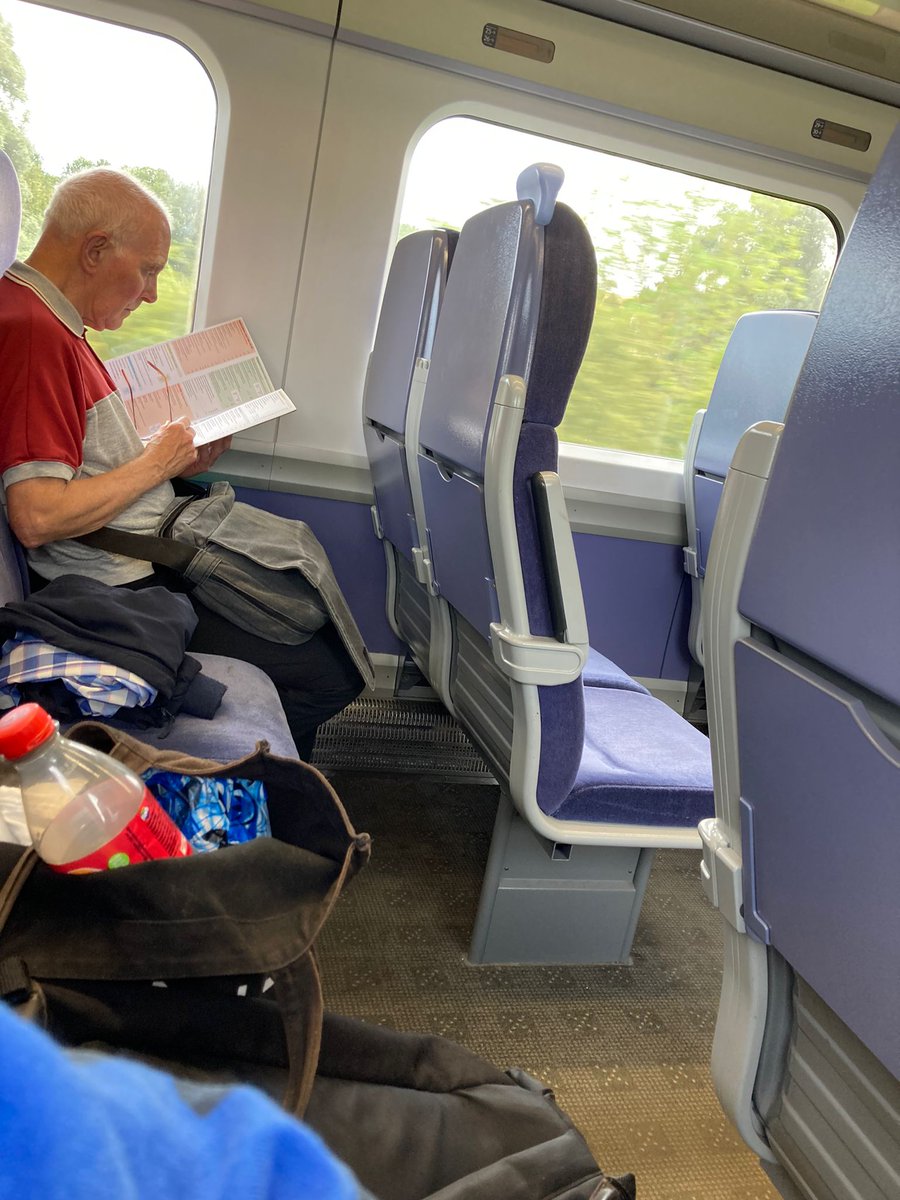 JoeShabadu's tweet image. this guy reading the wetherspoons menu for 15mins on the train yesterday