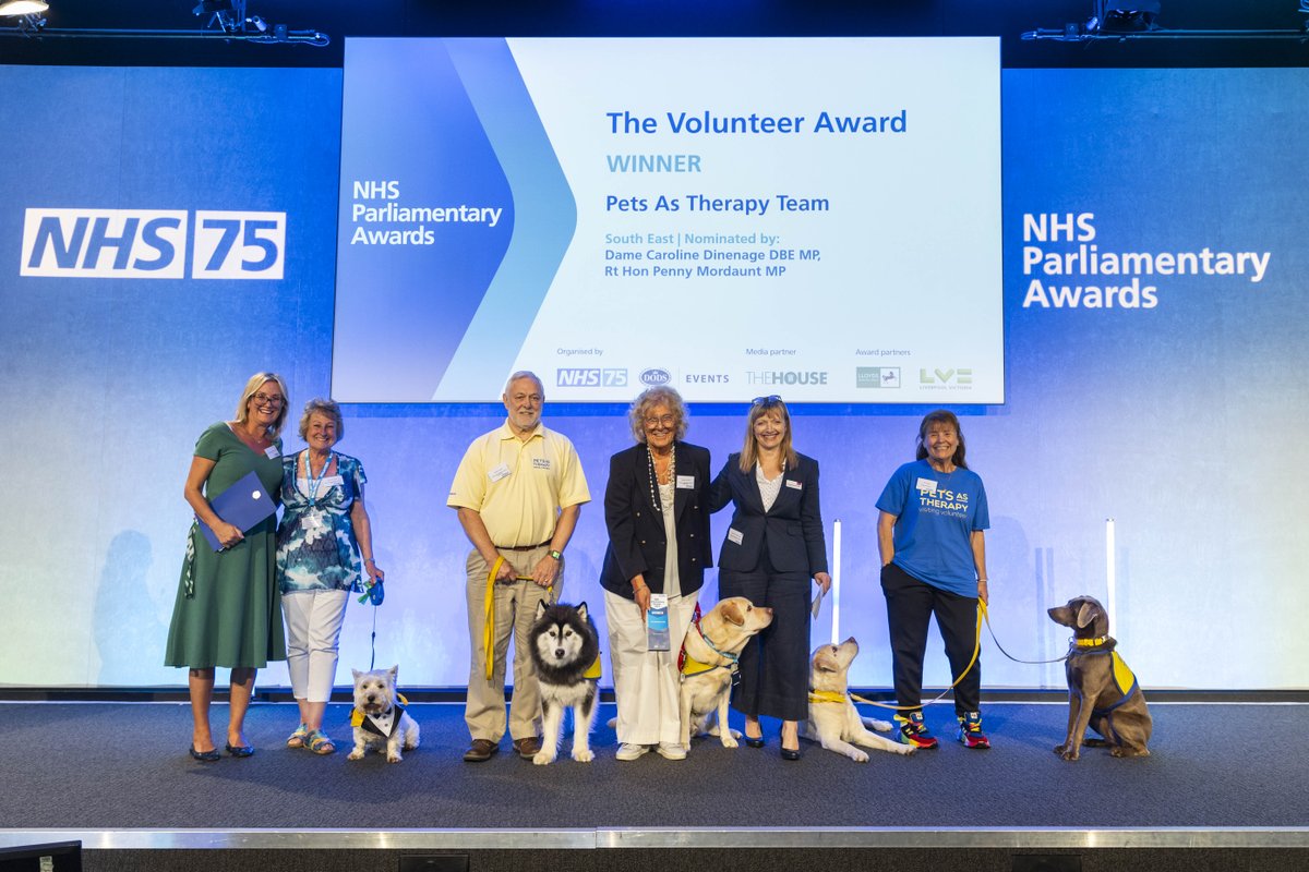 NHSEngland's tweet photo. Congratulations to the Pets As Therapy Team at @PHU_NHS for winning ‘The Volunteer Award’ at the #NHSParlyAwards.

These calming canines help soothe patients before an operation and also help boost morale during rehabilitation. 🐶 https://t.co/BXGNAzs8hC