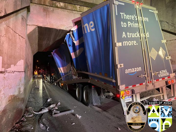 WTHRcom's tweet photo. "The bridge continues to hold the undefeated record at - Bridge: 3619836 Trucks: 0," wrote the Avon Police Department, while asking the public to avoid Raceway Road just south of U.S. 36 Wednesday morning after a semi got stuck under the bridge.

📷: Avon PD https://t.co/wygEloxTSA
