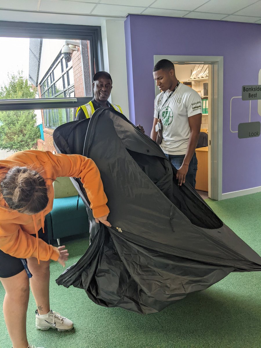 How many adults does it take to fold away a tent?