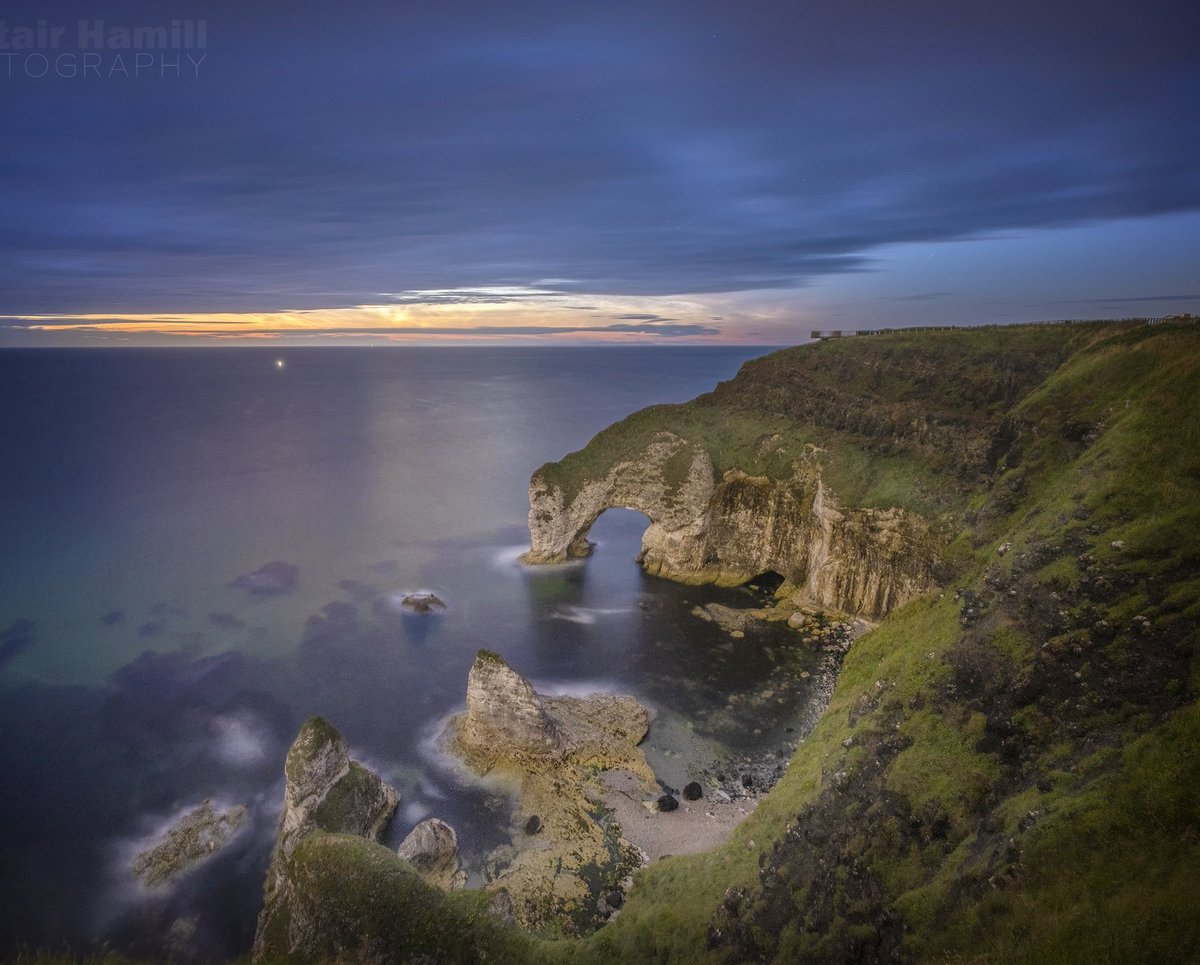A letterbox view of late season noctilucent clouds at the Wishing Arch, Causeway Coast last night.