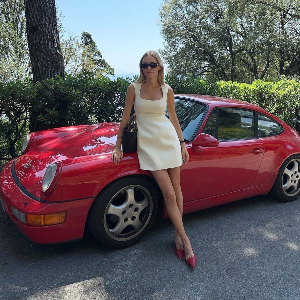 Claire Rose Cliteur in Portofino wearing our Double-Faced Wool Mini Dress. #ToryBurchPreFall23 #ToryBurch