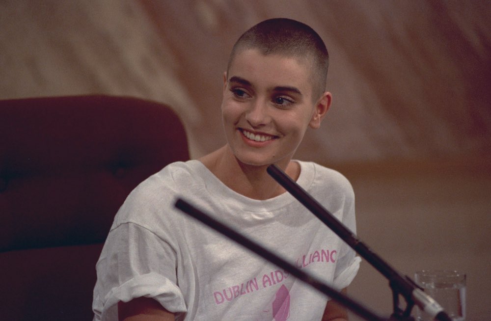 sinéad o’connor wearing a dublin AIDS alliance t-shirt on irish national tv in 1990 when homosexuality was still illegal in ireland. ♡
