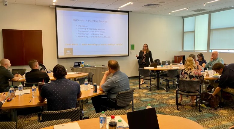 WFLA's tweet photo. ‘Nobody is immune from it’: After data breaches, local officials take cybersecurity awareness class at USF  | @WFLATrevor reports:   https://t.co/EP0K0twqCO https://t.co/GgYhBdK6G7